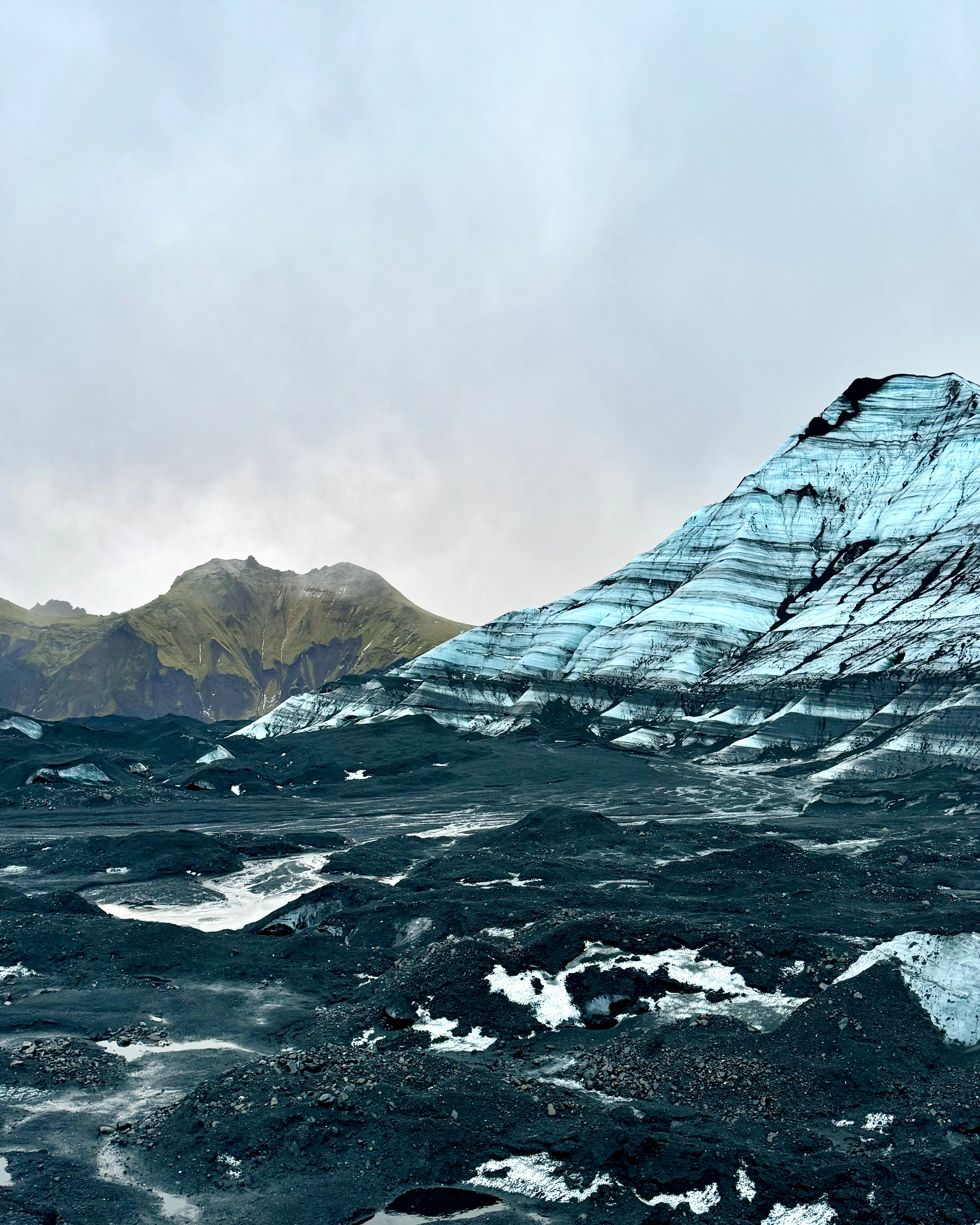 A place where the glacier meets the mountains